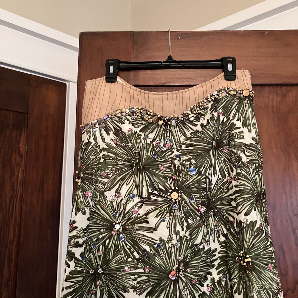 Embellished Floral skirt  Beaded waistline camel border with cocoa stitching.
